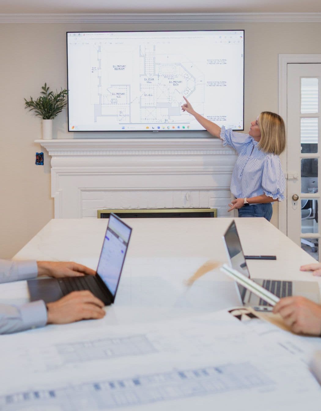 Team in Bethesda Contracting conference room