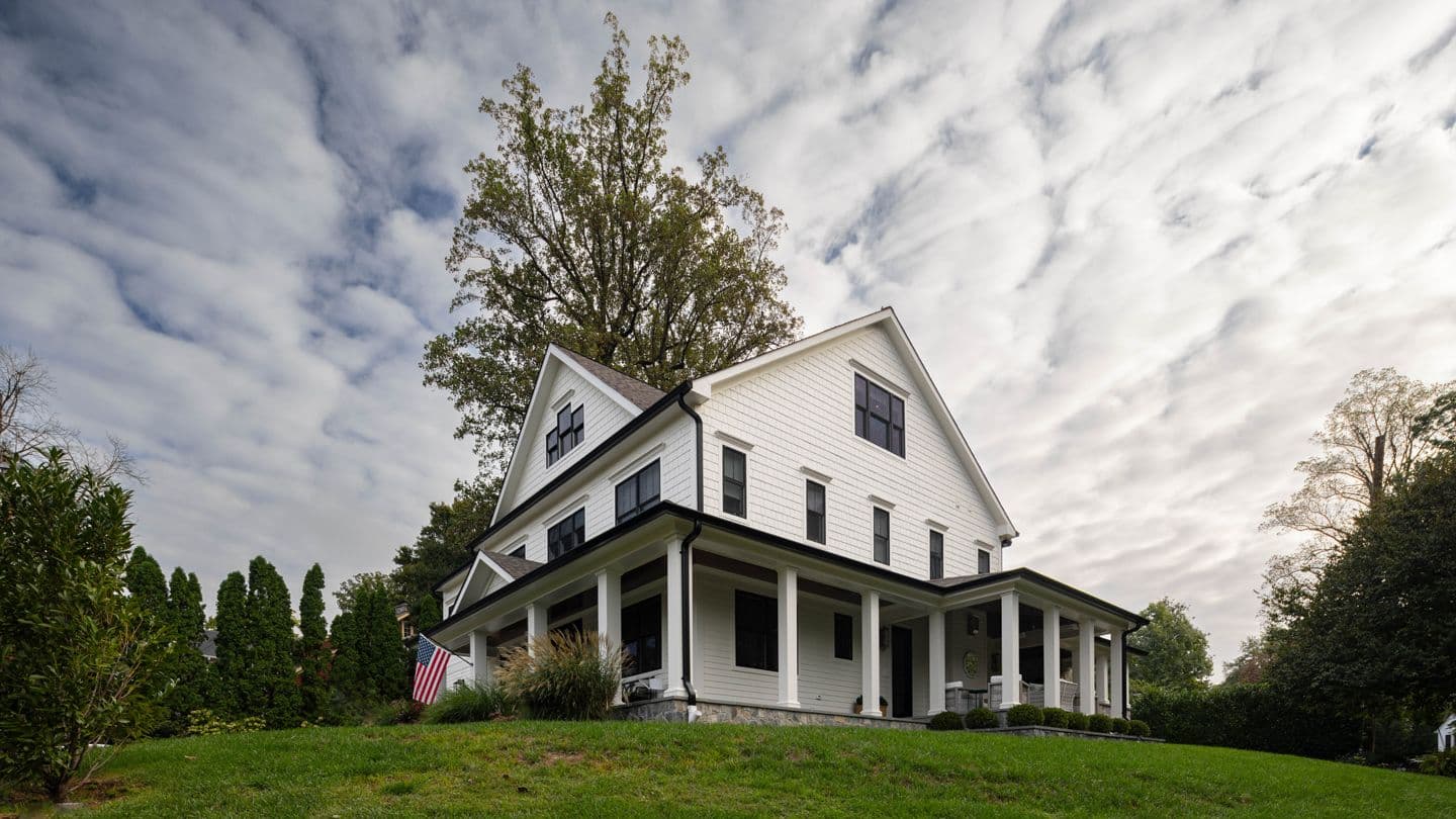 Image of a white house worked on by Bethesda Contracting